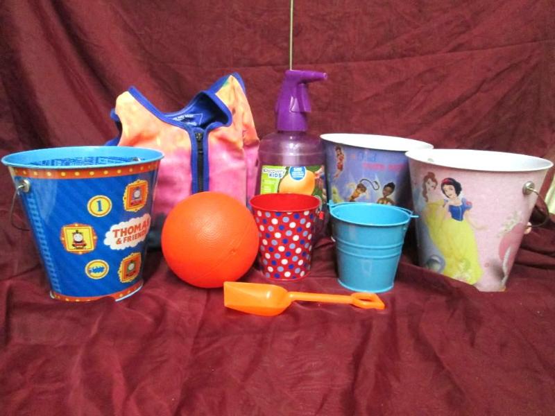 Lot of childrens beach items. Bucke...