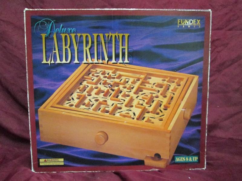 Labyrinth board game. Ages 8 and up...