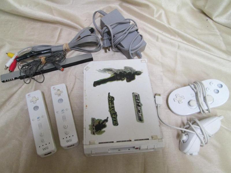 Nintendo WII white. Three different...