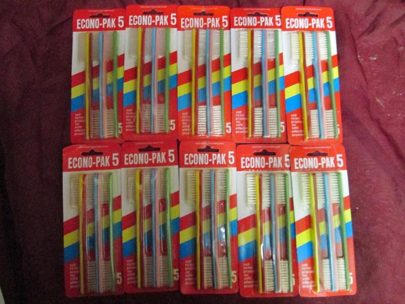 Lot of 10 packages of five toothbru...