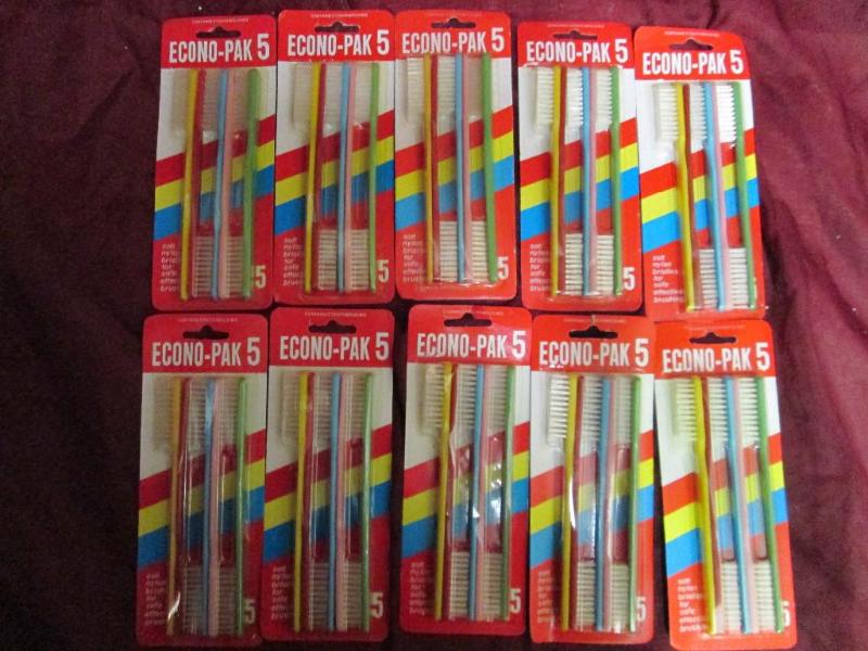 Lot of 10 packages of five toothbru...