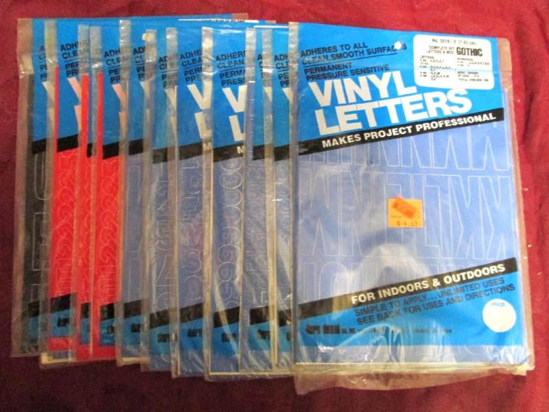 Lot of 13 packages of vinyl adhesiv...