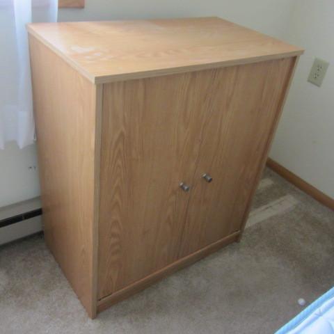Small 2-door storage cabinet and ta...