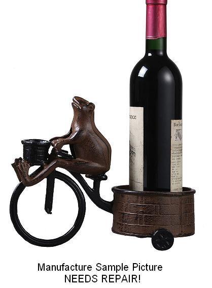 lot 29 image: Cast Iron High Wheel Wine Holder wi...