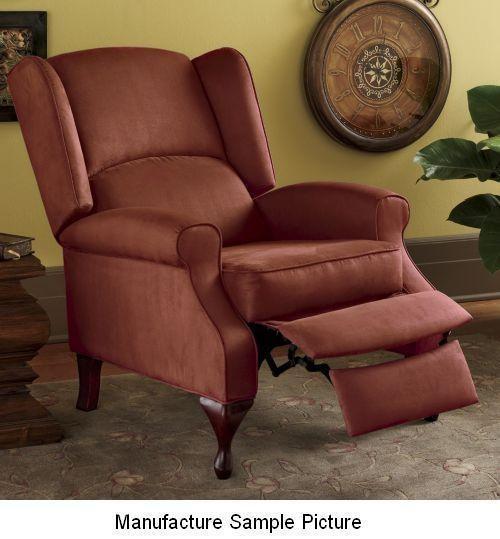 lot 57 image: Rust Wingback Recliner It has easy-...