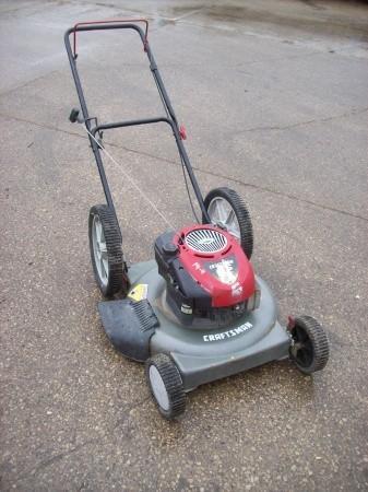 lot 21 image: Craftsman walk behind mower  lawnm...