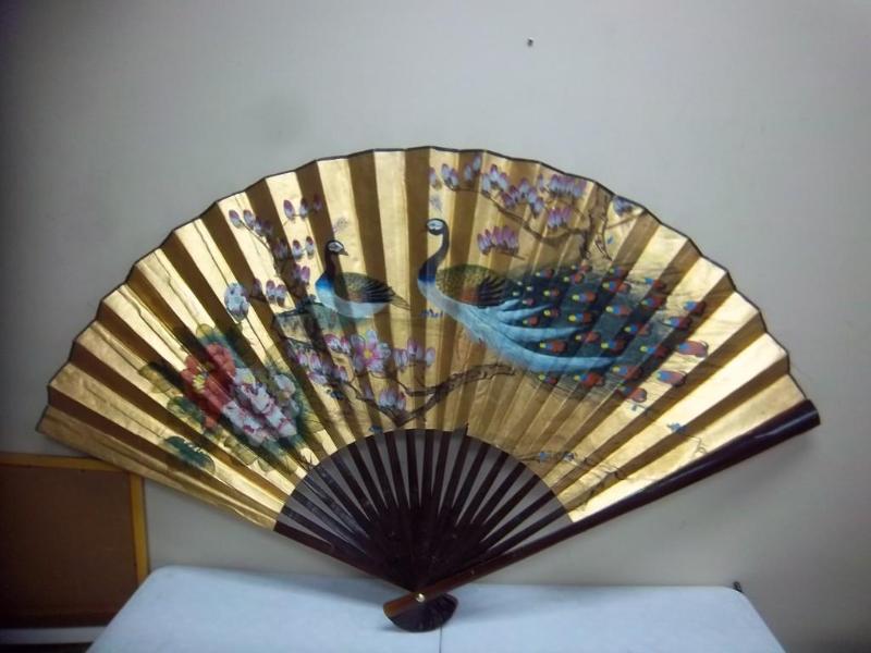 lot 16 image: Large Decorative Peacock Fan...