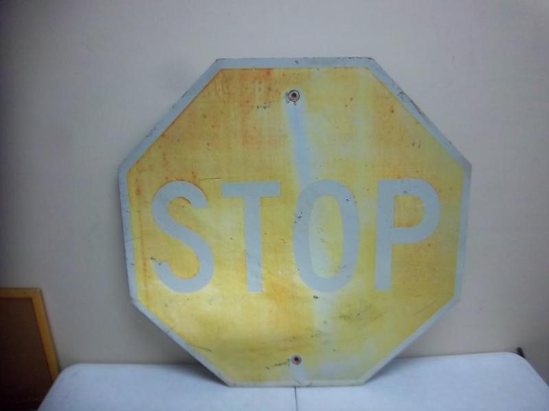 lot 19 image: Large Faded Out Stop Sign...