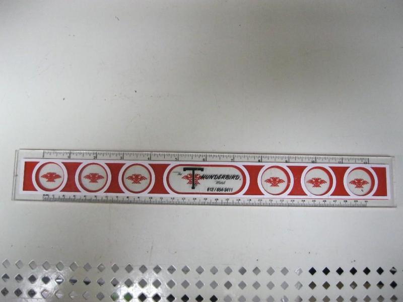 lot 93 image: Vintage Thunder Bird Motel Ruler...