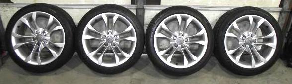 lot 76 image: Set of (4) Audi Rims and Tires ...