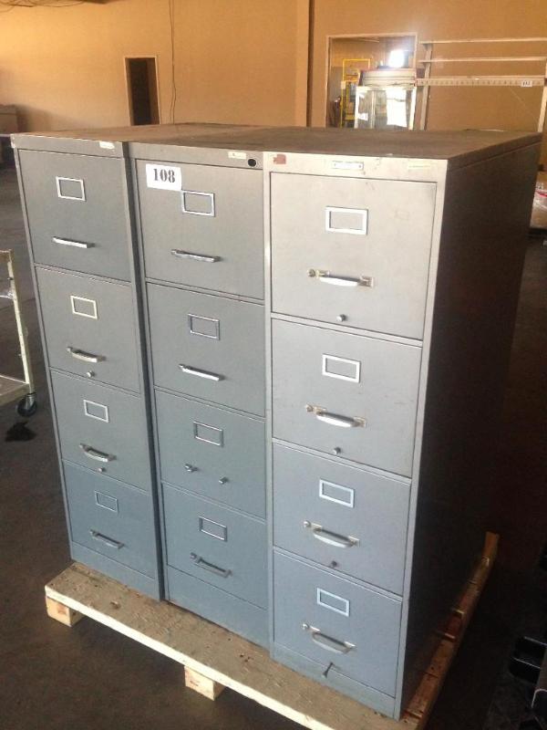 Lot of 3 4-drawer filing cabinets....