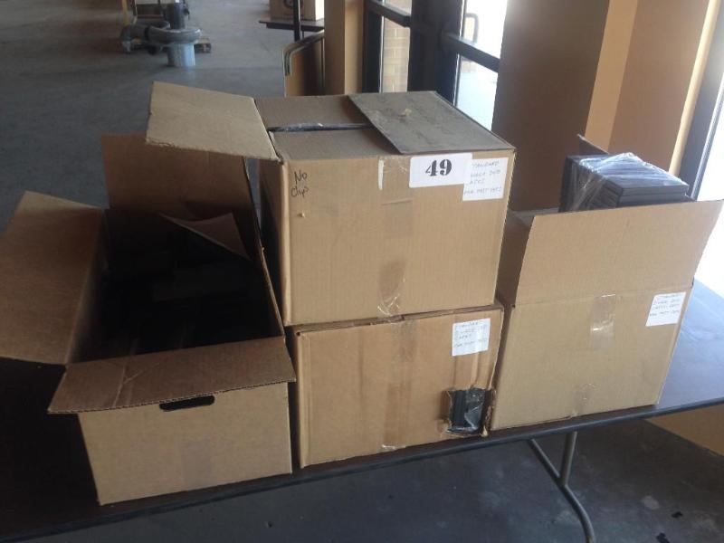 4 boxes of misc. new DVD and CD cas...