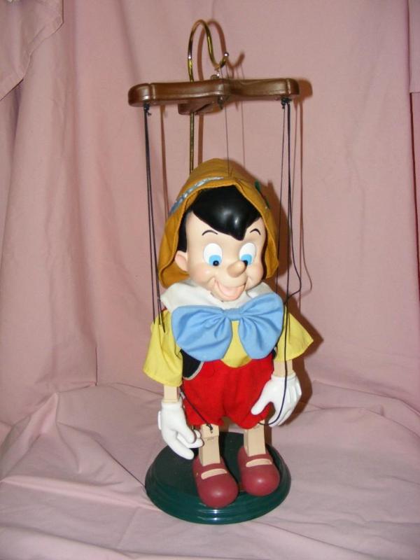 lot 1 image: Pinocchio Marionette Doll, Disney C...