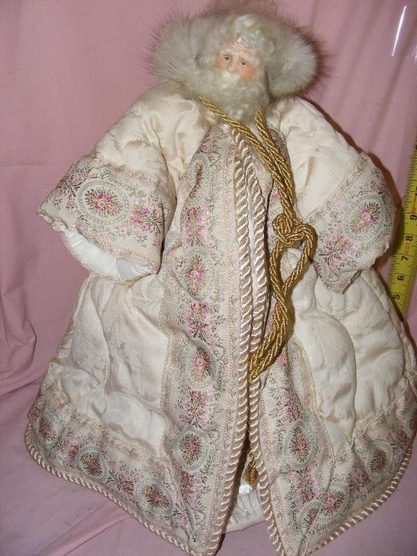 lot 106 image: Two homemade Santas...