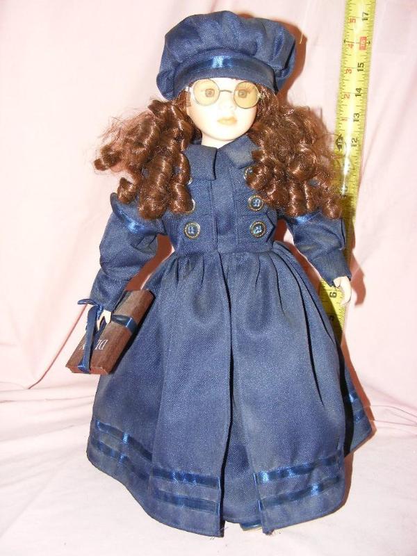 lot 123 image: Porcelain Doll, carrying Diary...