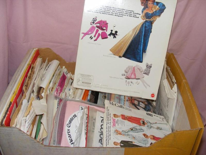 lot 124 image: Box of Doll Clothes Patterns...
