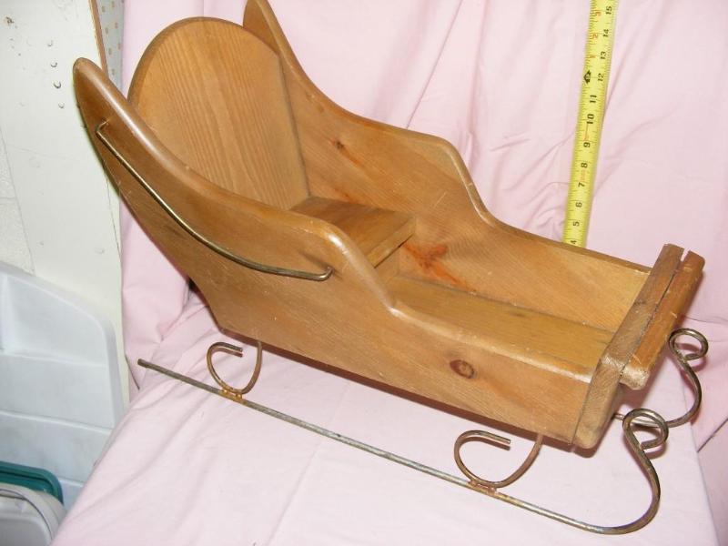lot 125 image: Wooden Sleigh with metal runners...