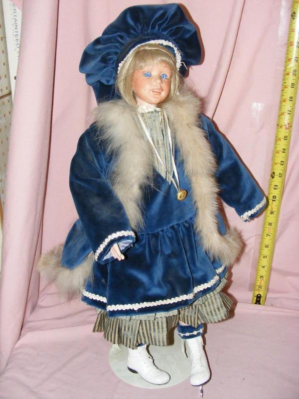 lot 128 image: Porcelain Skater Doll on stand, one...