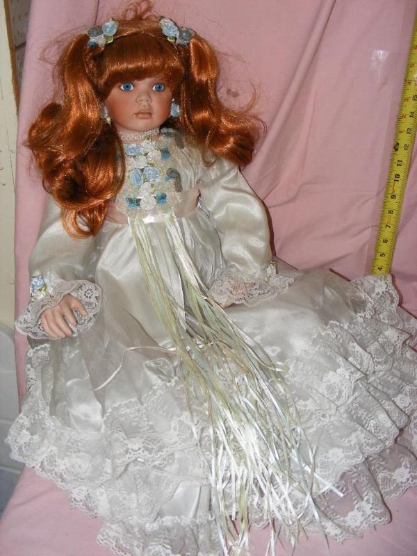 lot 129 image: Toddler Doll...