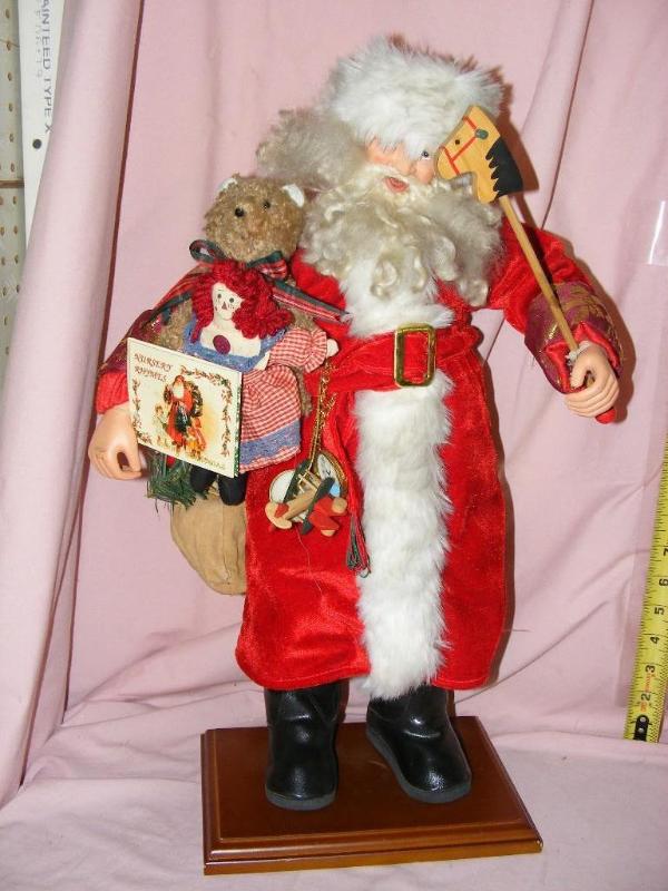 lot 135 image: Santa on wooden pedestal...