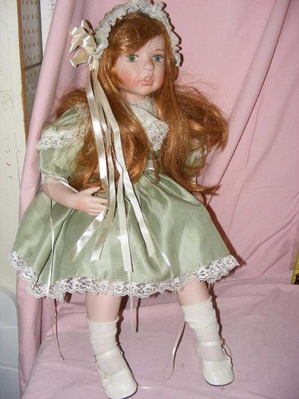 lot 139 image: Toddler Doll, she needs something t...