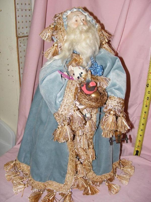 lot 155 image: Santa with blue robe...