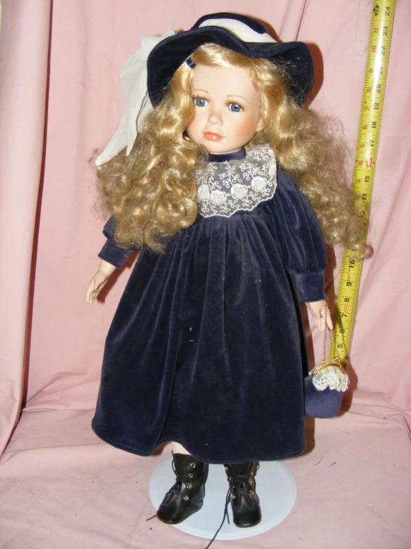 lot 158 image: Doll with blue velvet dresshat...