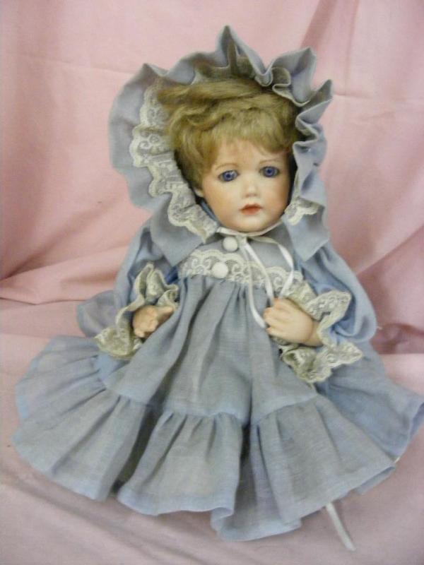 lot 191 image: Porcelain Doll...