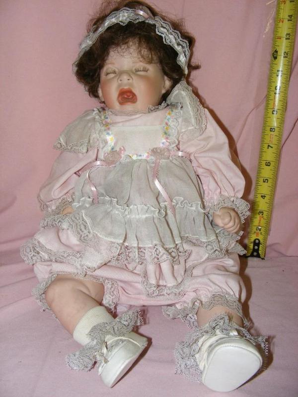 lot 22 image: Porcelain Baby Doll...
