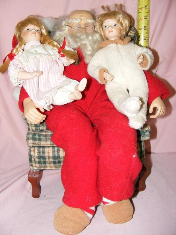 lot 35 image: Santa with small girls sitting on h...