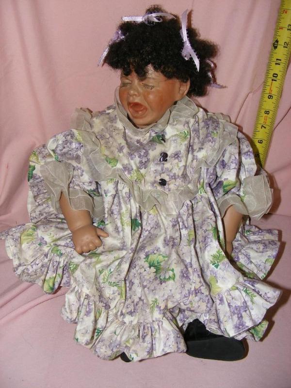 lot 38 image: Crying Baby Doll...