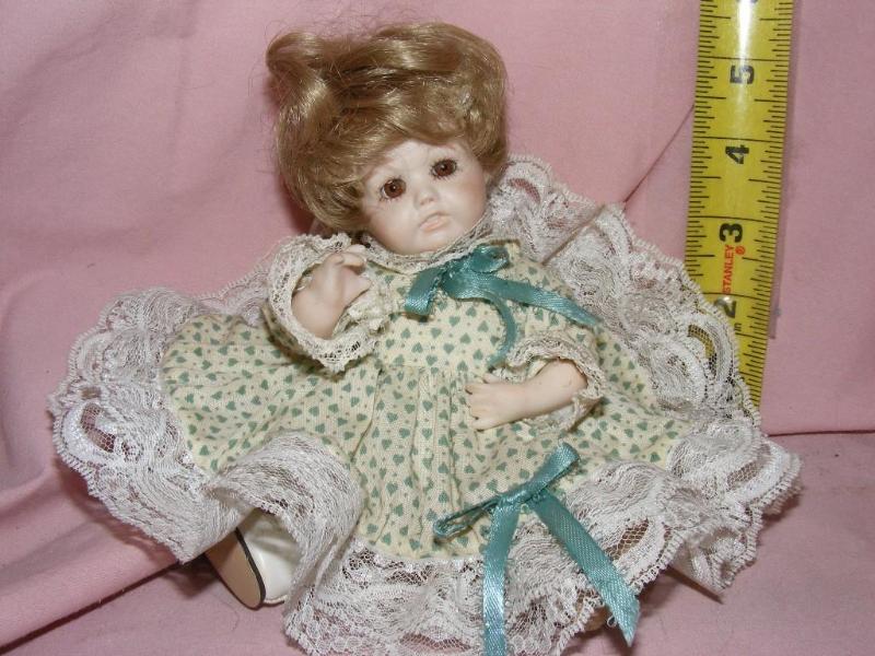 lot 69 image: Porcelain Baby Doll &nbsp...