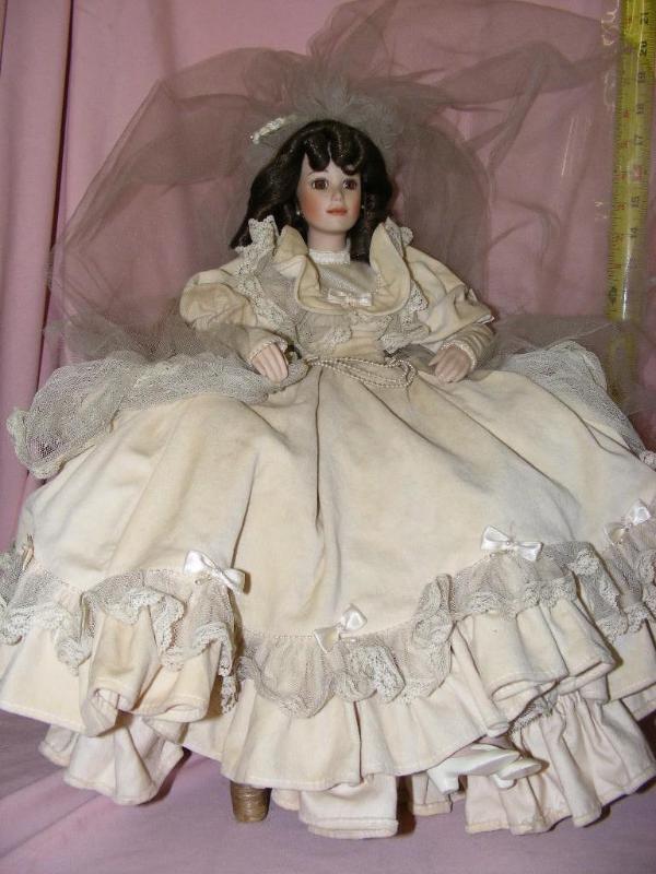 lot 70 image: Bride Doll with Wicker Chair...