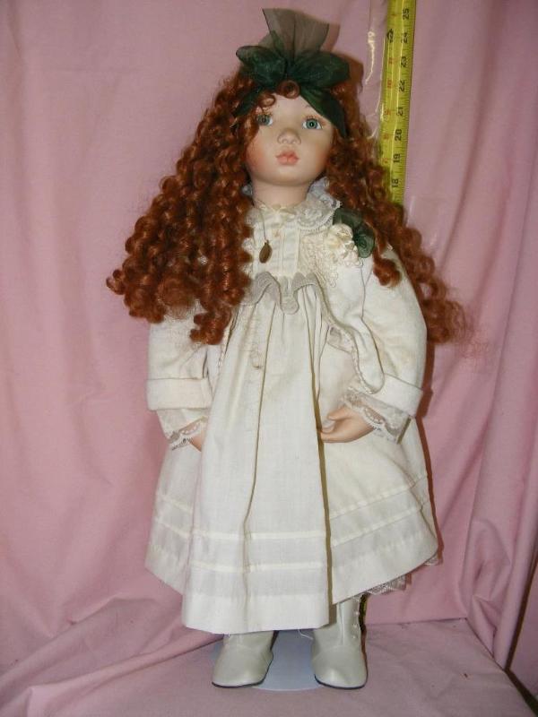 lot 85 image: Porcelain Doll, Amber made by...