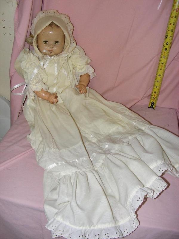 lot 92 image: Old Baby Doll, face and arms are cr...