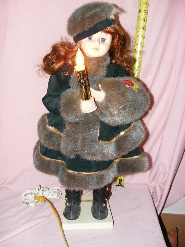 lot 95 image: Animated Doll with Light, works...