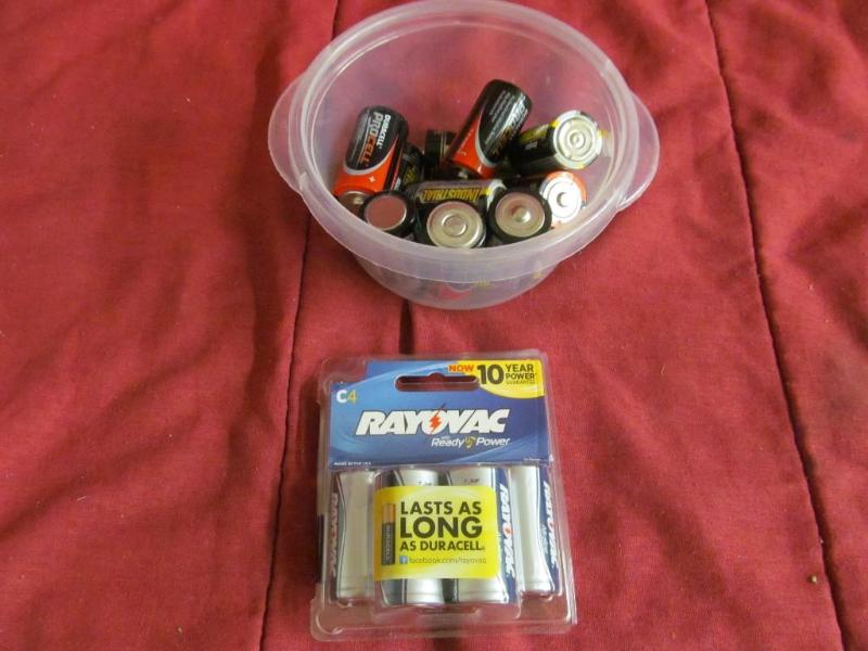Container of C Batteries and One Pa...