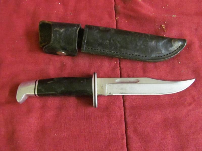 Buck 119 Hunting Knife in leather s...