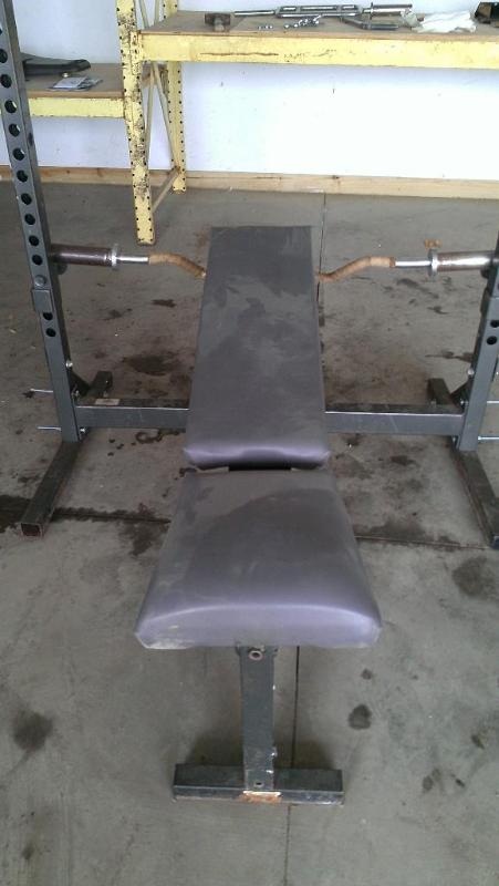 Deluxe bench with squat rack. Inclu...