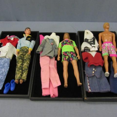Three Ken type dolls with clothes, ...