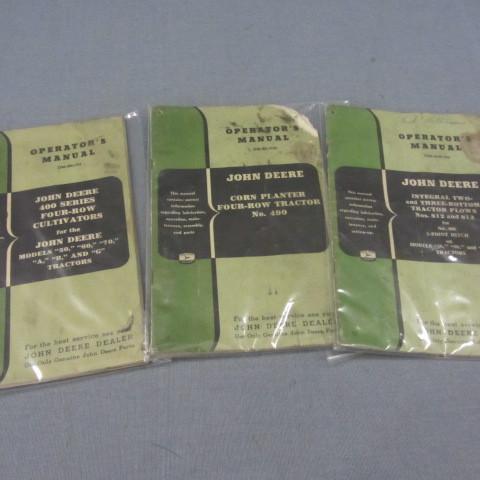 John Deere operators manuals, thre...