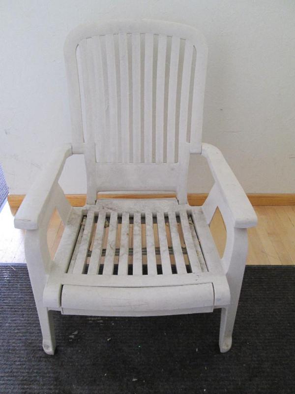 lot 166 image: Outdoor poly resin chair on wheels....