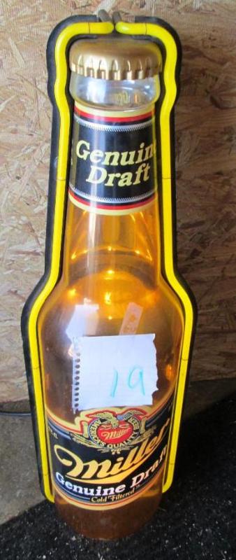 lot 19 image: Miller genuine draft lighted bottle...