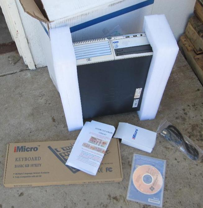 lot 23 image: HP compaq computer with nwindows XP...