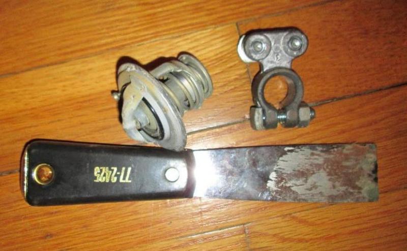 lot 235 image: Scraper, battery terminal and sprin...