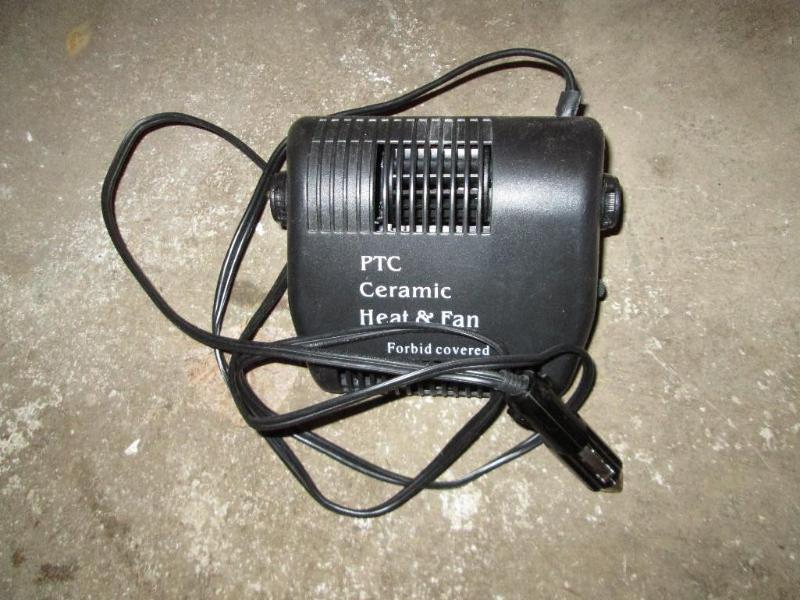 lot 263 image: Auto lighter plug powered fan  hea...
