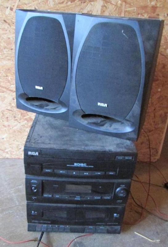 lot 48 image: RCA stereo with 3 disc changer tune...