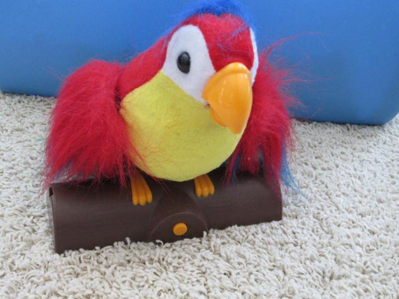 lot 60 image: Parrot - flaps its wings and talks...
