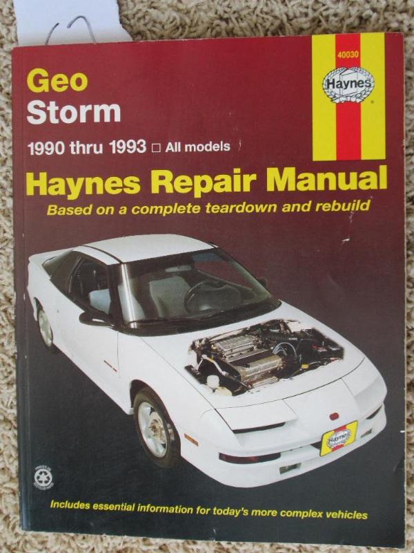 lot 67 image: Geo Storm 1990 - 1993 Haynes repair...