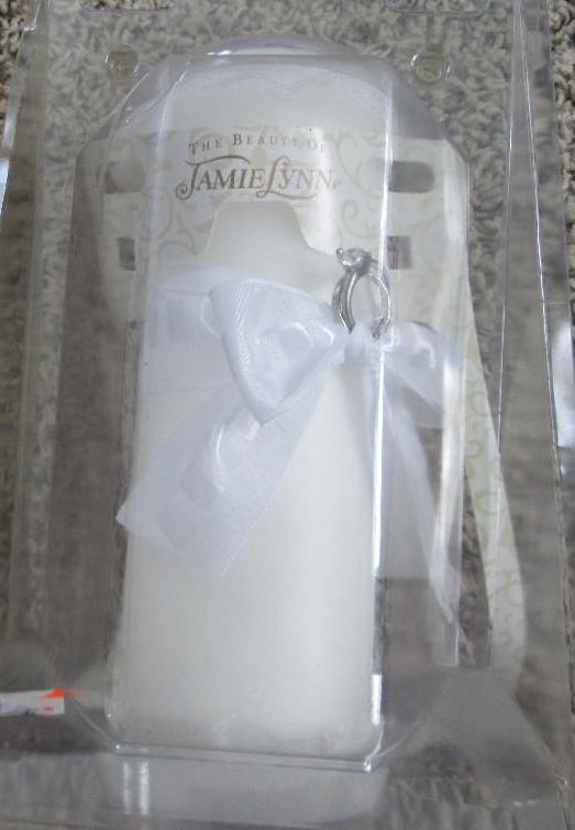 lot 87 image: Jamie Lynn wedding unity candle...